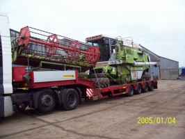  	TRANSPORT claas bizon merkator massey fergusson john deere fortschritt dominator case kombajn new holland fendt international